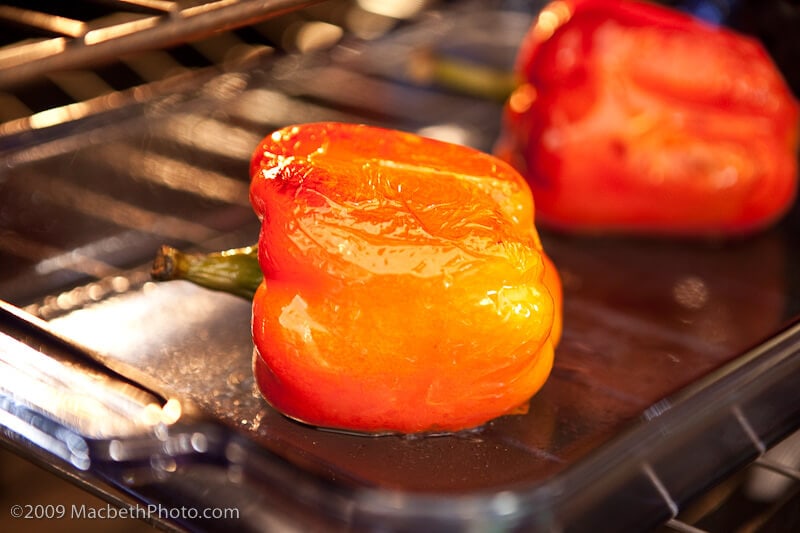 Roasting red peppers in the oven. The skin has started to brown.