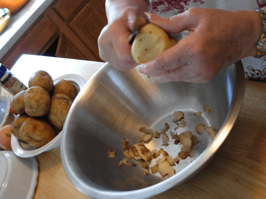 My grandmother's hands peeling potatoes.