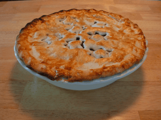 A photo of a baked and finished tourtiere (meat pie)