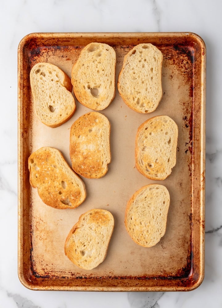 Toasted bread on a sheet pan