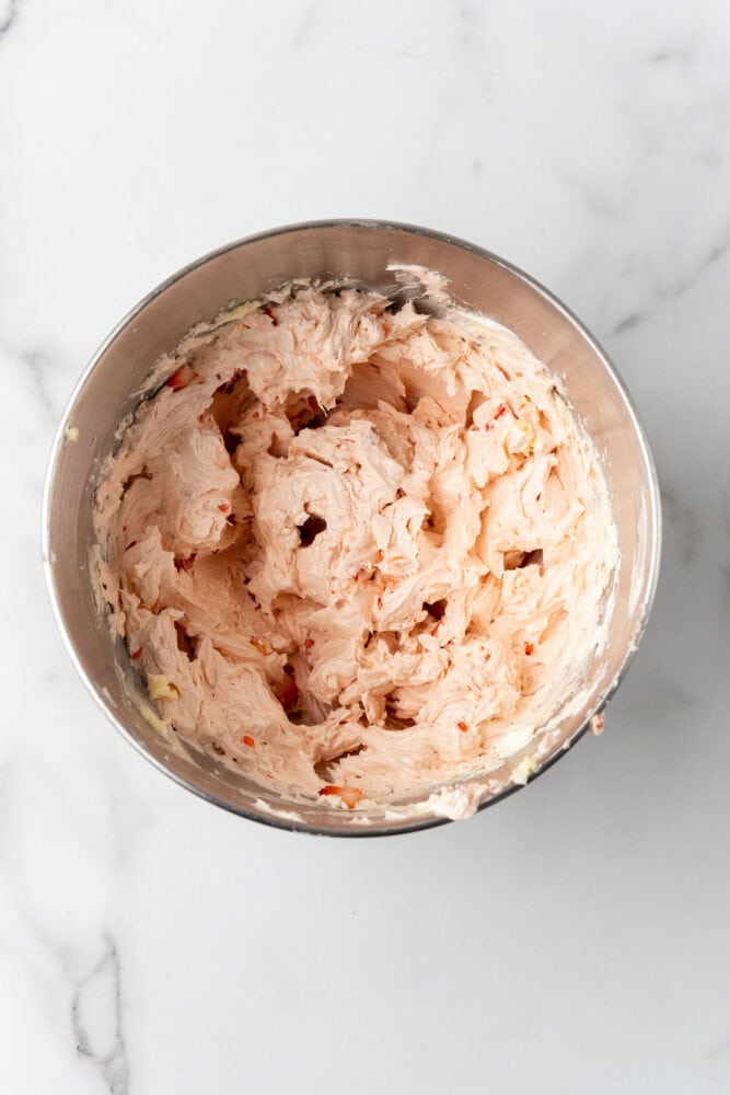 whipped strawberry butter in mixing bowl