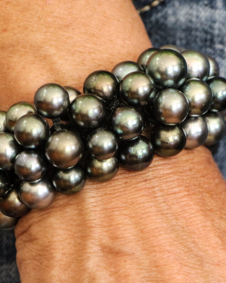 bracelet with a large grouping of bora bora black pearls