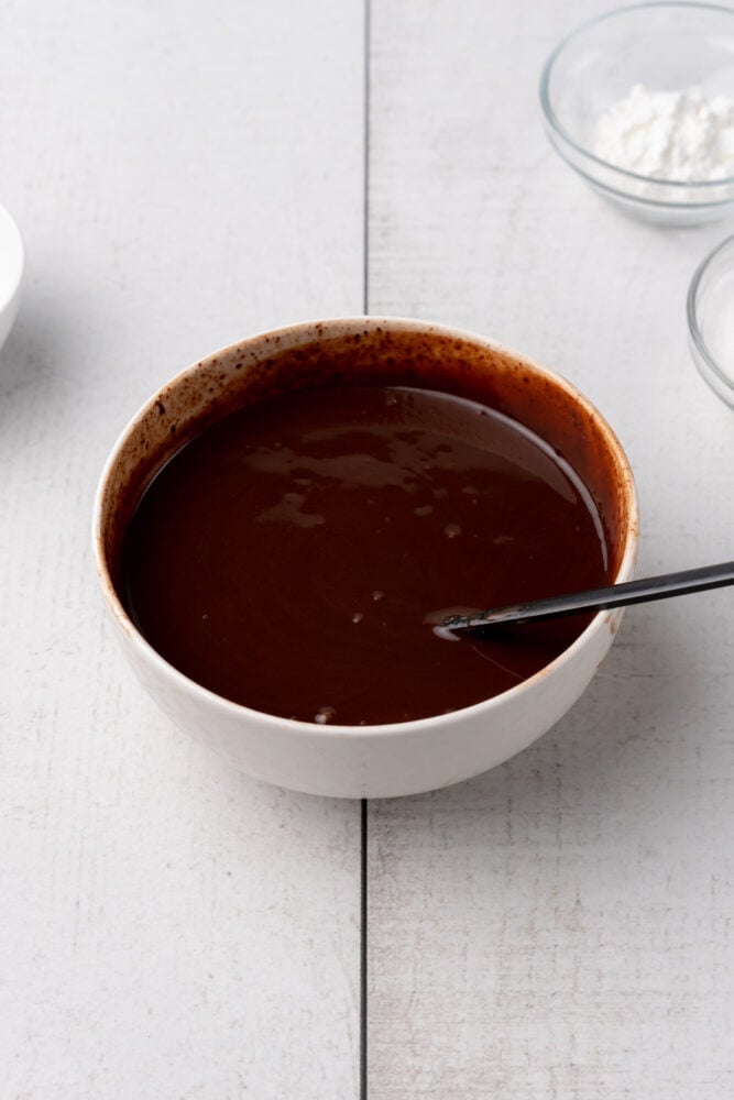 Bowl of dark chocolate ganache.