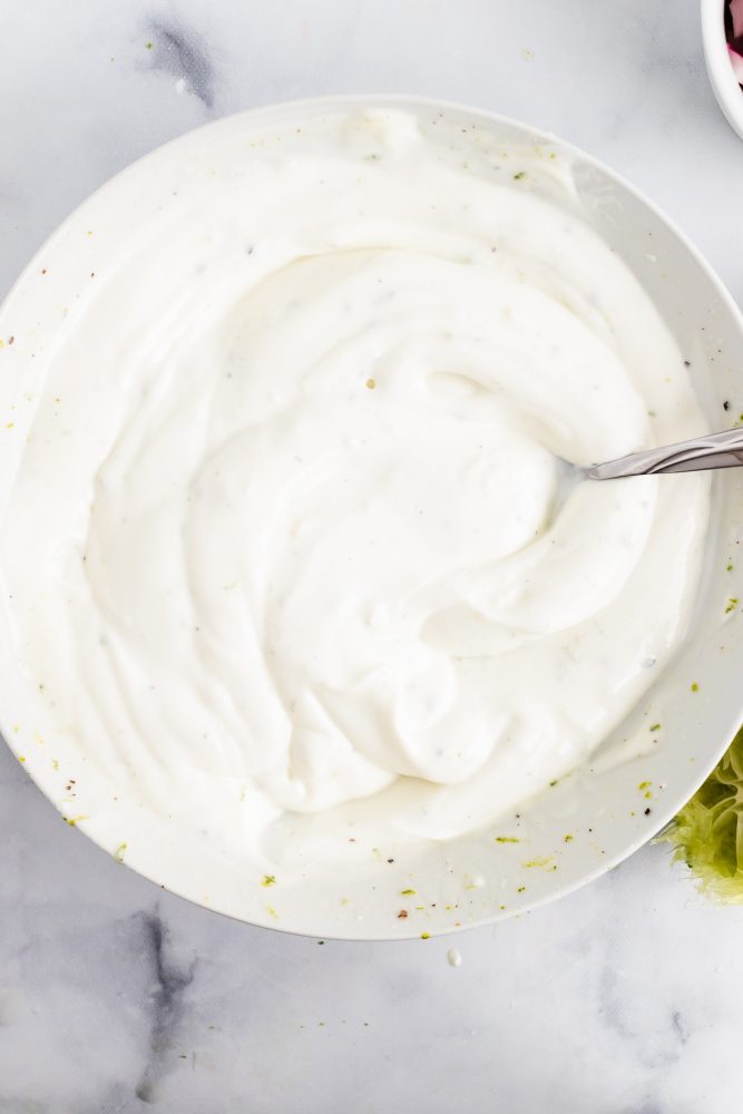 Overhead shot of smooth and creamy bowl full of the blended dressing.