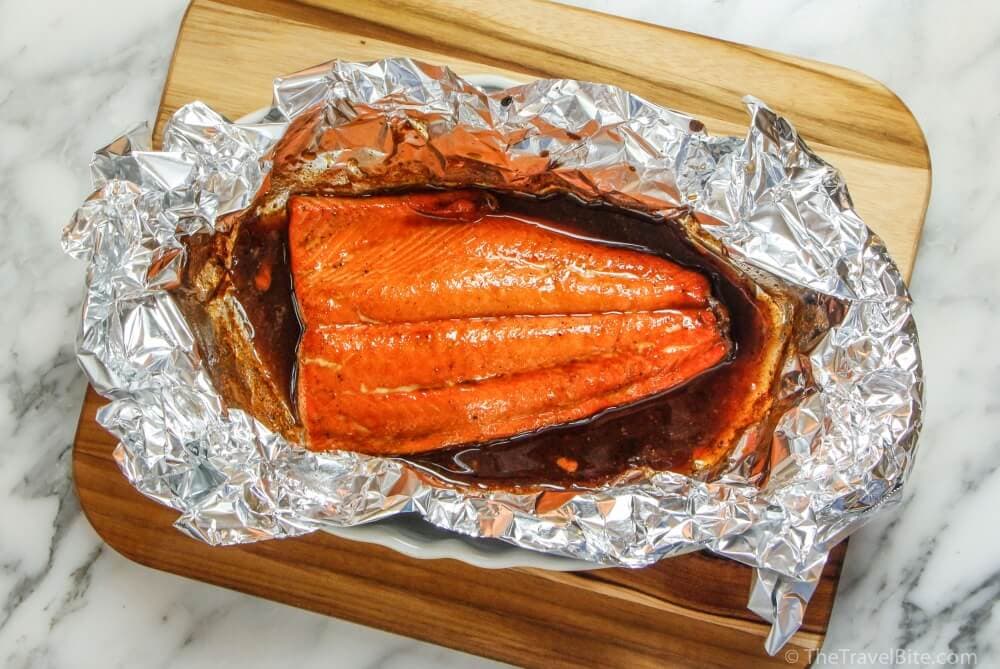 Sockeye Salmon in foil wrapper with maple glaze fresh out of the oven.