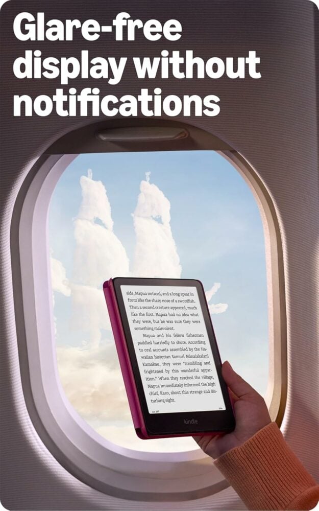 Showing the kindle paperwhite held with one hand on a plane