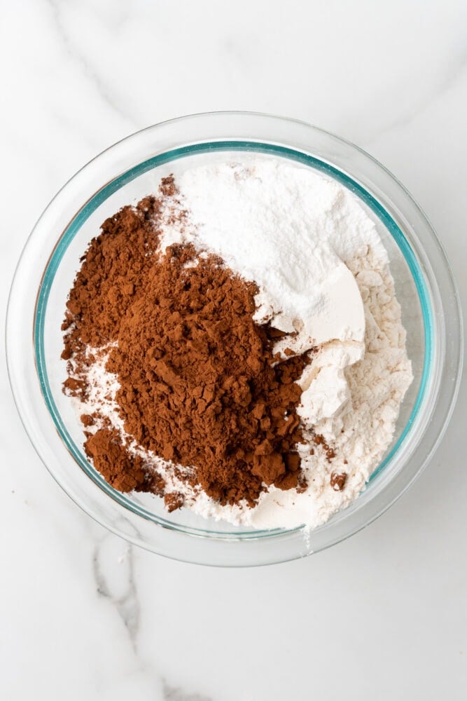 cocoa, flour, and sugar in a clear glass bowl