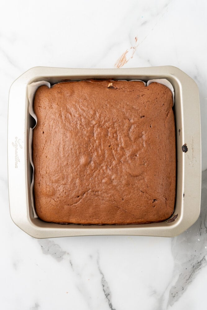 baked brownies in square pan before adding mocha frosting.