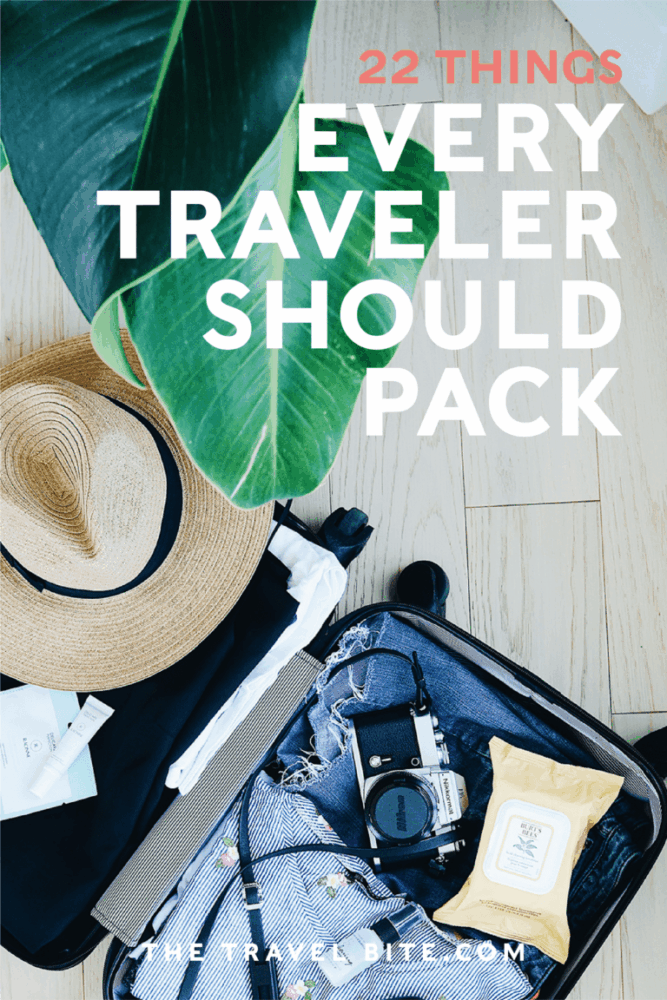 Travel Essentials Every Traveler Should Pack Pin ... Photo of suitcase with hat, clothes, camera, and wipes.