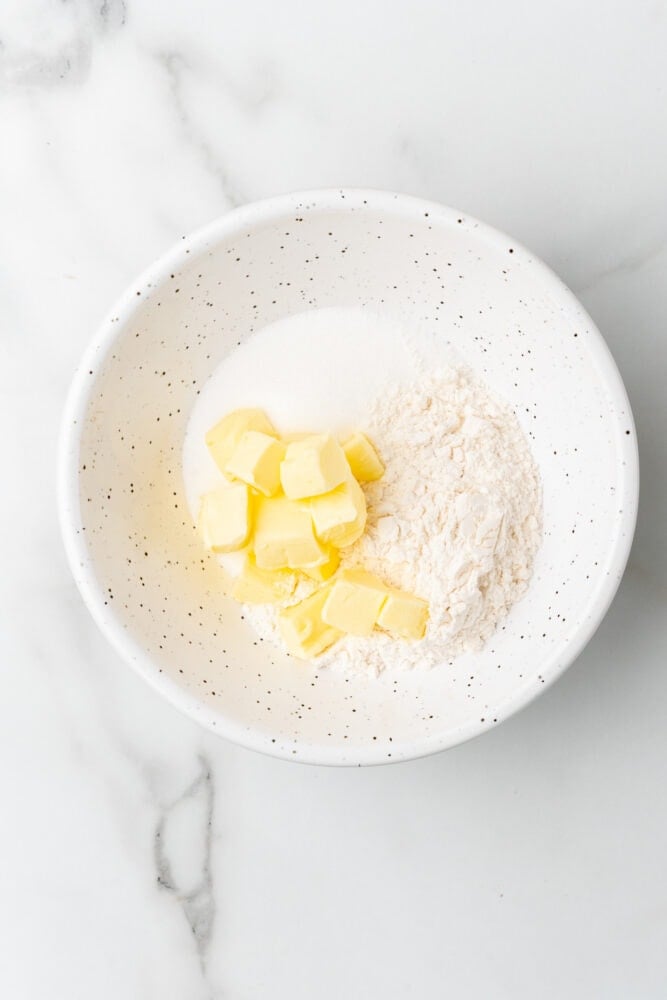 butter, sugar, and flour in a bowl