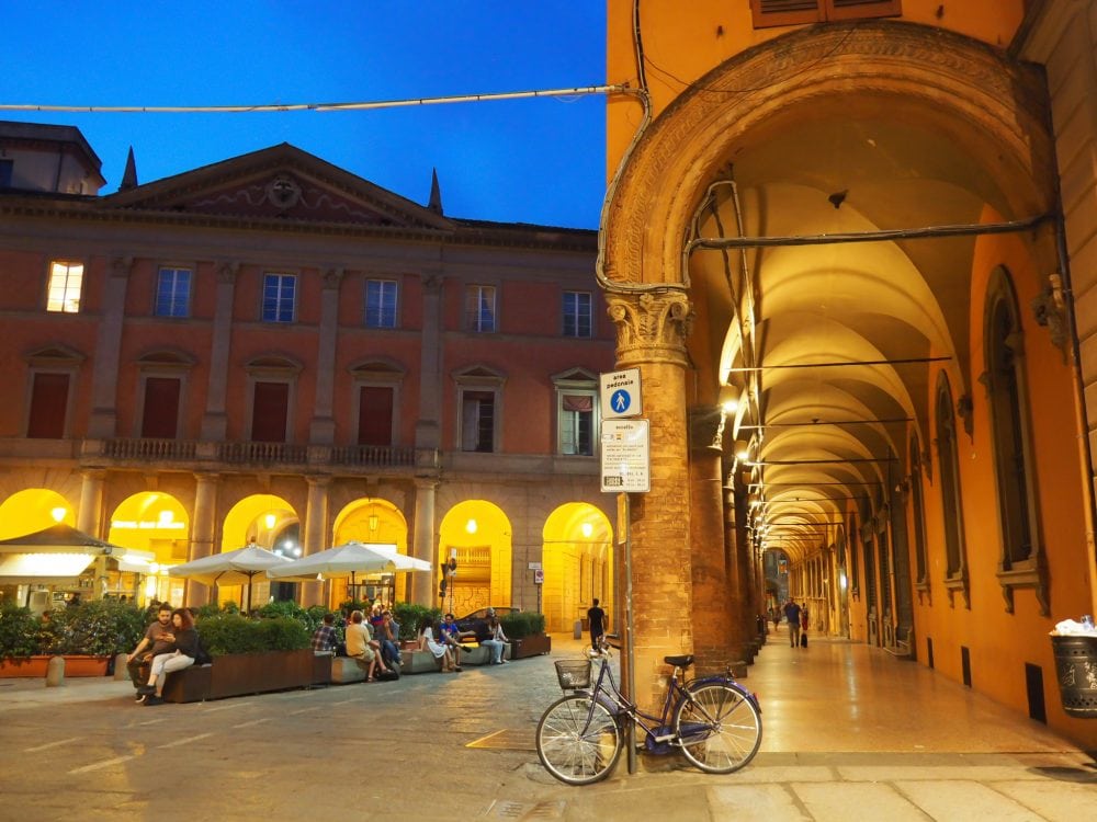 Bologna's UNESCO World Heritage porticoes at twilight.