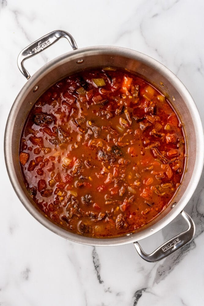 all clad pot filled with spicy tomato soup