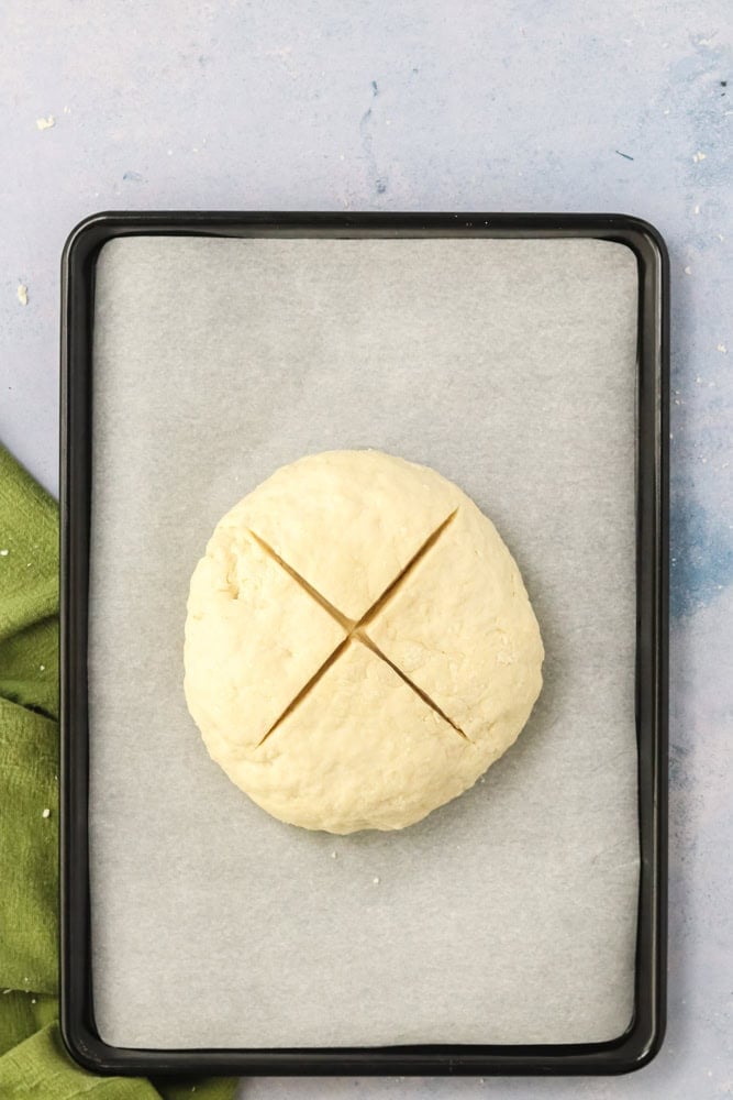 dough for Irish soda bread before baking with cross in it