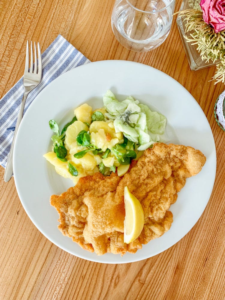 Austrian Potato Salad Recipe - Overhead photo of pork schnitzel with potato salad.