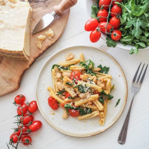 Strozzapreti with Roasted Tomatoes, Arugula, and Cannellini Beans