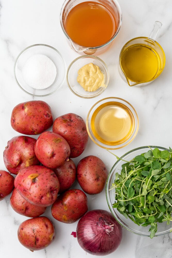 Ingredients for Austrian potato salad including: red potatoes olive oil red onion vegetable broth brown mustard (Estragon mustard, if you have it. Dijon also works well.) apple cider vinegar (white wine vinegar is a good subsitute too) sugar salt and pepper microgreens