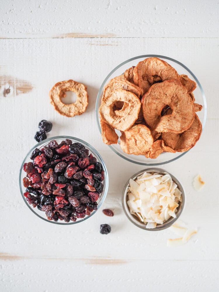 Overhead shot of dried fruits: apples, berries, coconut.