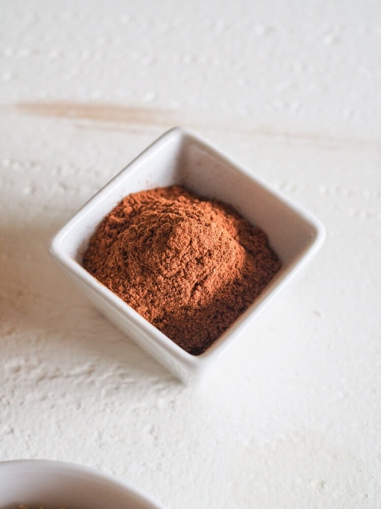 Cinnamon in a square prep bowl.