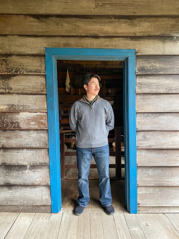 Pete standing in a wood frame doorway at Mount Locust, an old inn along the Natchez Trace.
