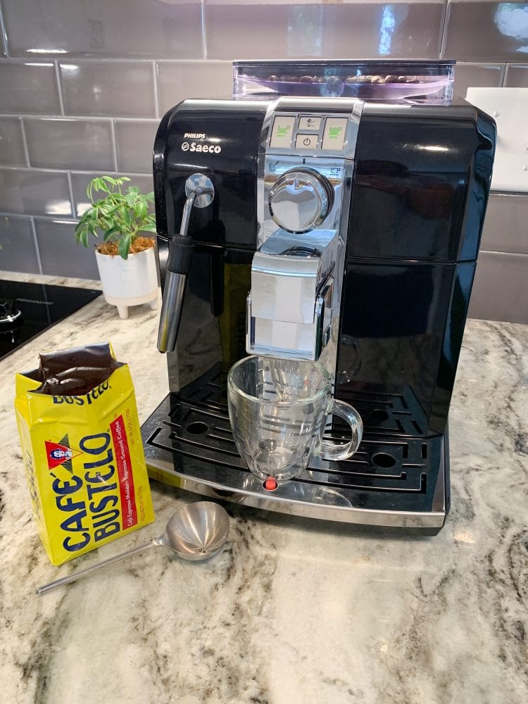 Saeco espresso machine with cafe bustelo ready to brew.