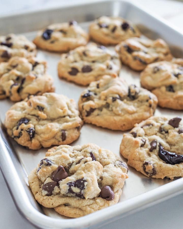 Sheet pan with baked cherry chocolate chip cookies