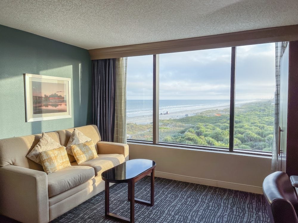 View of beach and green canopy of park from Hilton Cocoa Beach