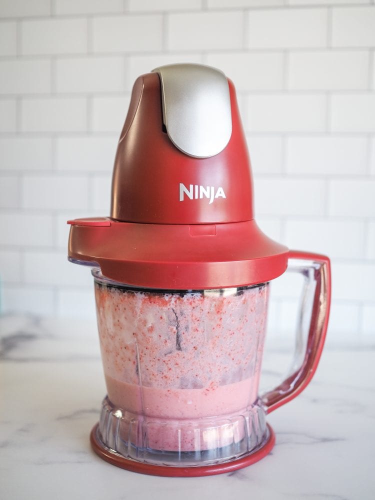 Ninja Storm blender with strawberry puree and strawberry liqueur blended and read for strawberry tiramisu.