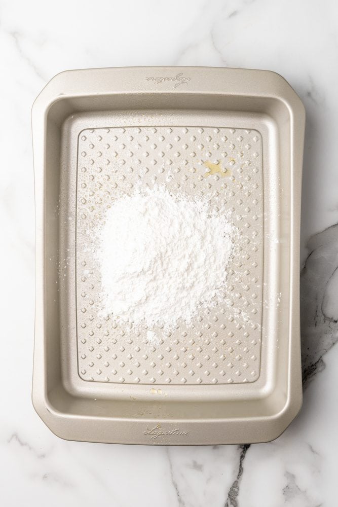 powdered sugar on a 9x13" baking pan