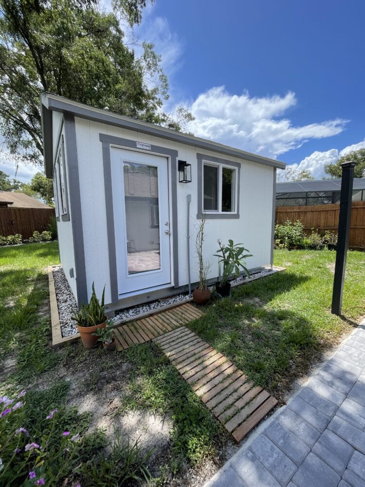 White and grey Tuff Shed she shed office.