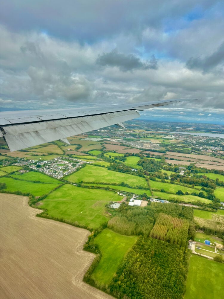 Look at green patches of land in Ireland from airplane window