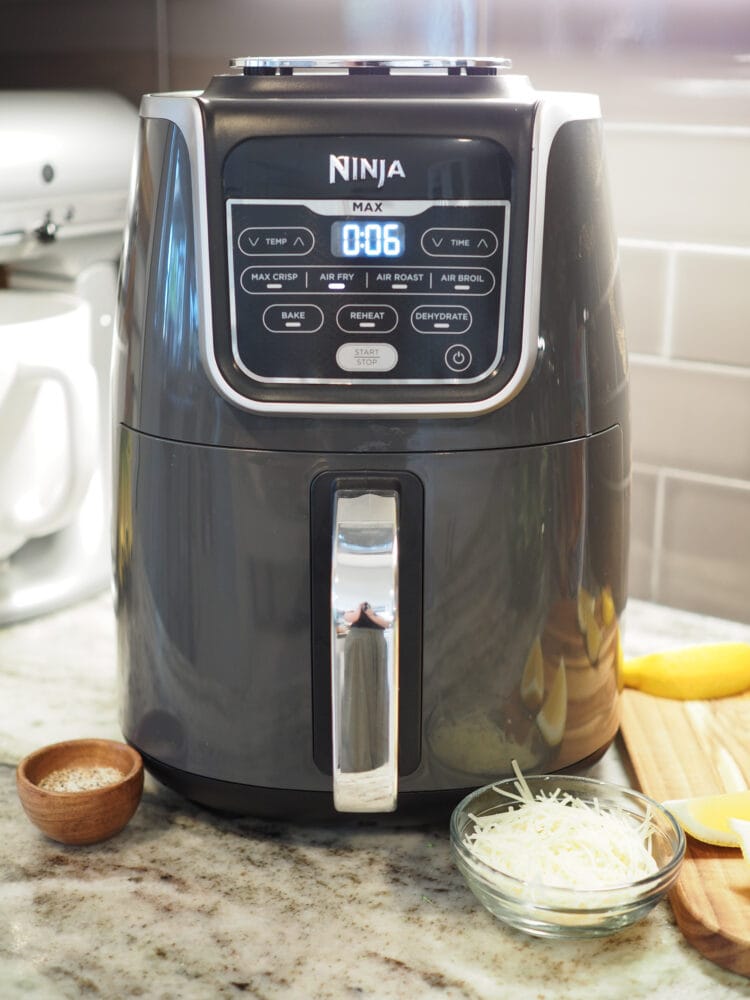 Ninja air fryer with six seconds left of cook time.