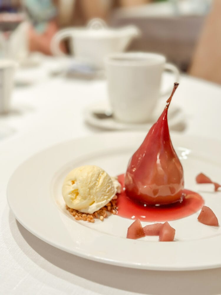 Red wine poached pear and ice cream dessert on board Viking River Cruise.