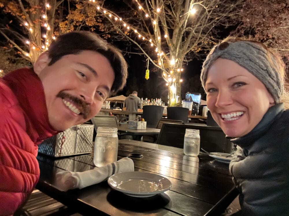 Rachelle and Pete bundled up for the cold weather having dinner outside at Idletyme Brewing Company