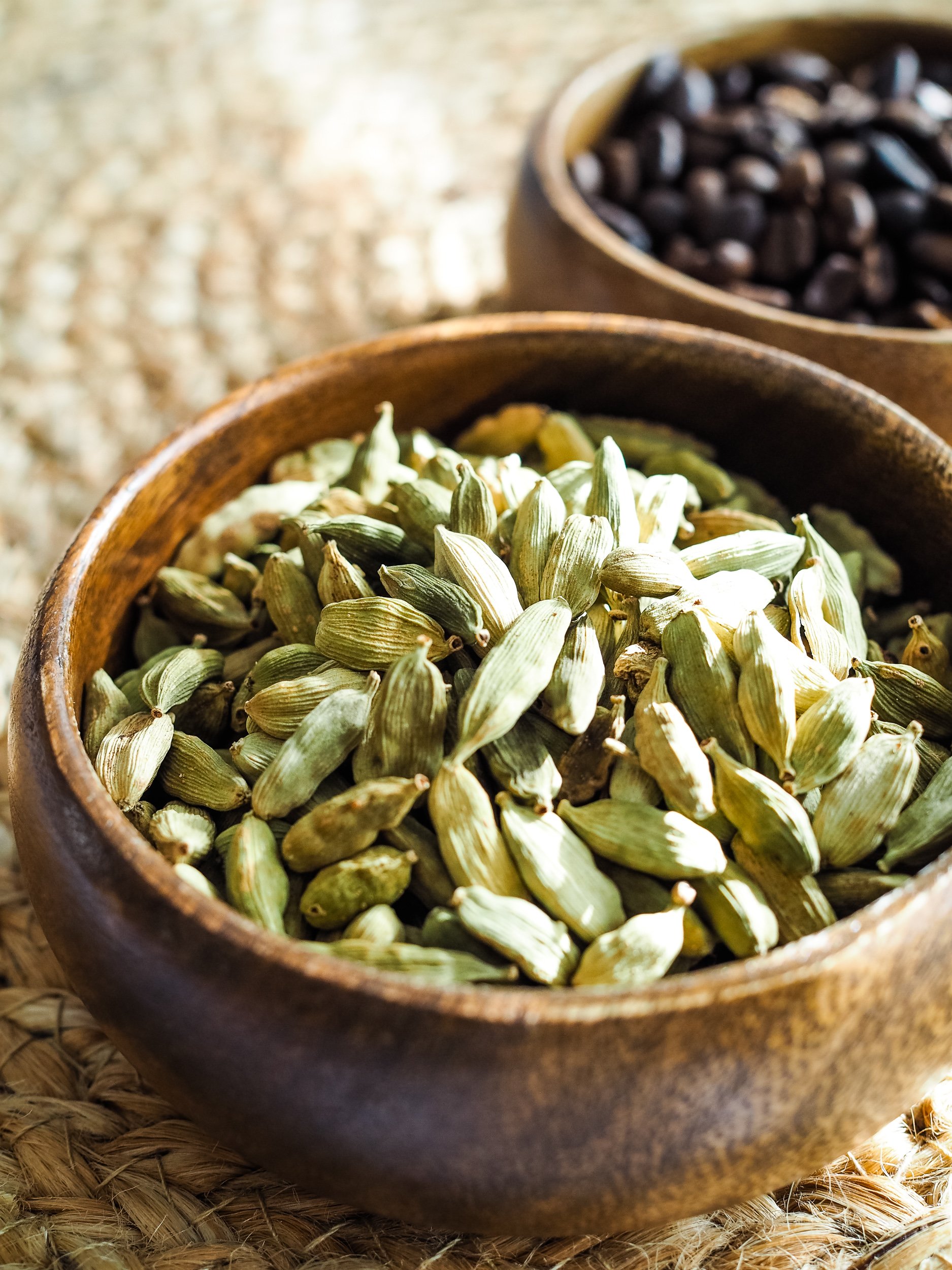 whole cardamom pods. They're light green in color and the outside looks similar to a rough corn husk.