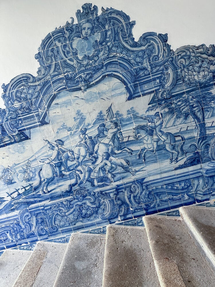 Blue and white tiles along the stairs