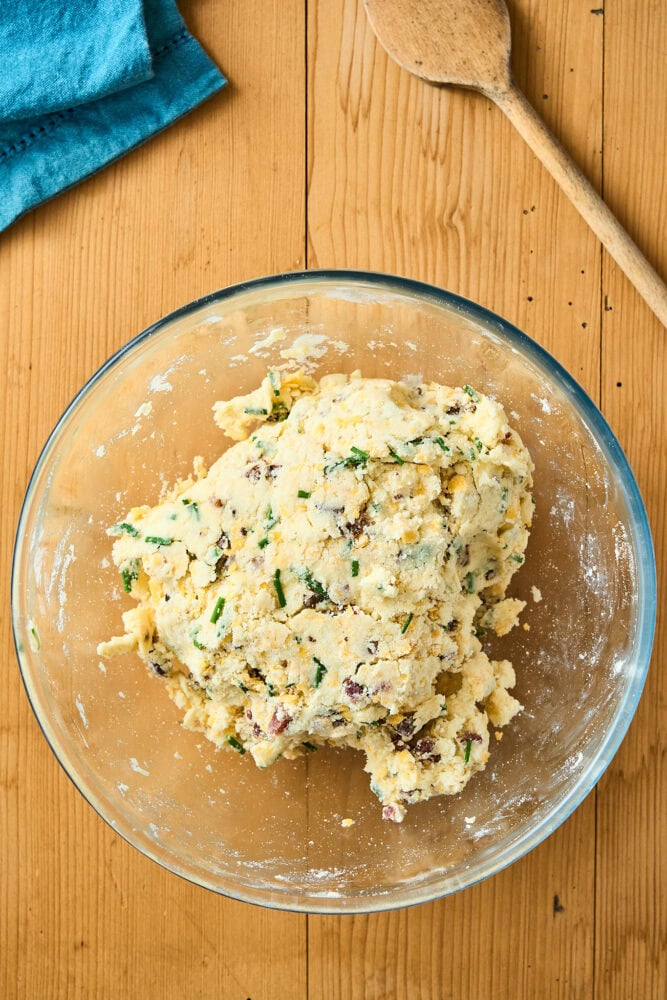 bacon cheddar scone dough in a bowl