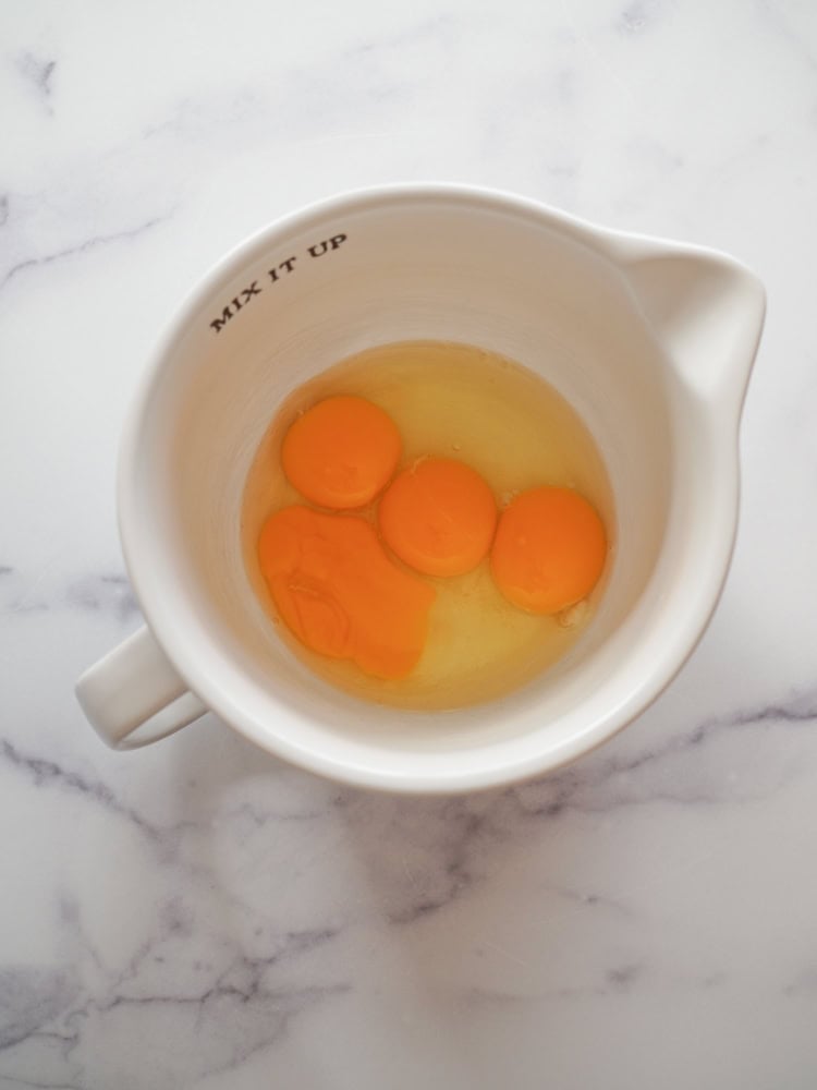 Eggs and egg yolks in a bowl