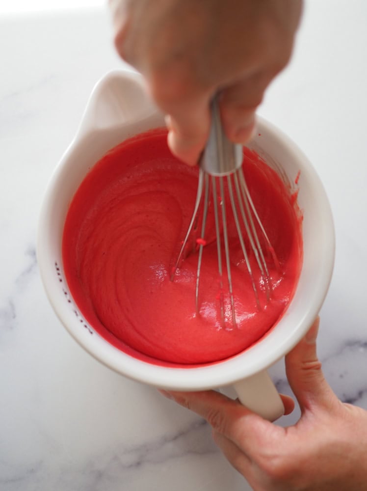 whisking cranberry tart filling