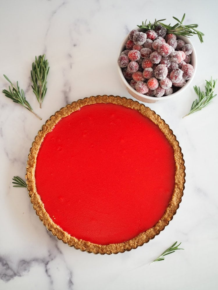 cranberry tart with side of sugared cranberries