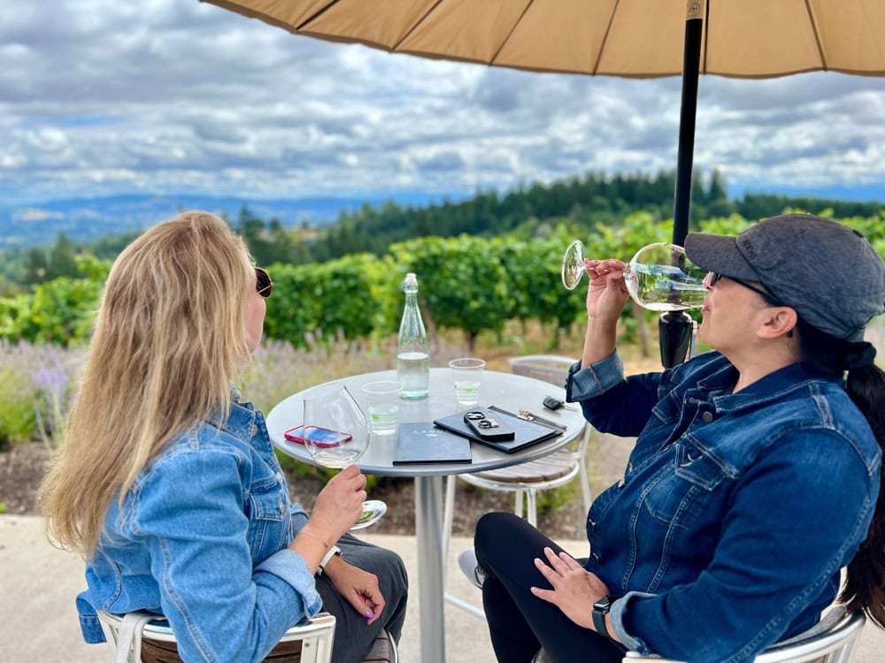 Rachelle and Christina drinking wine at Lange