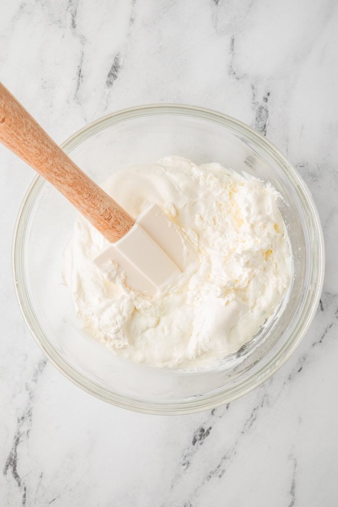 key lime cheesecake filling in a glass bowl