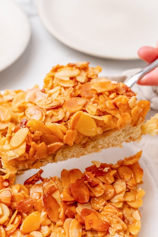 slice of almond tart being served