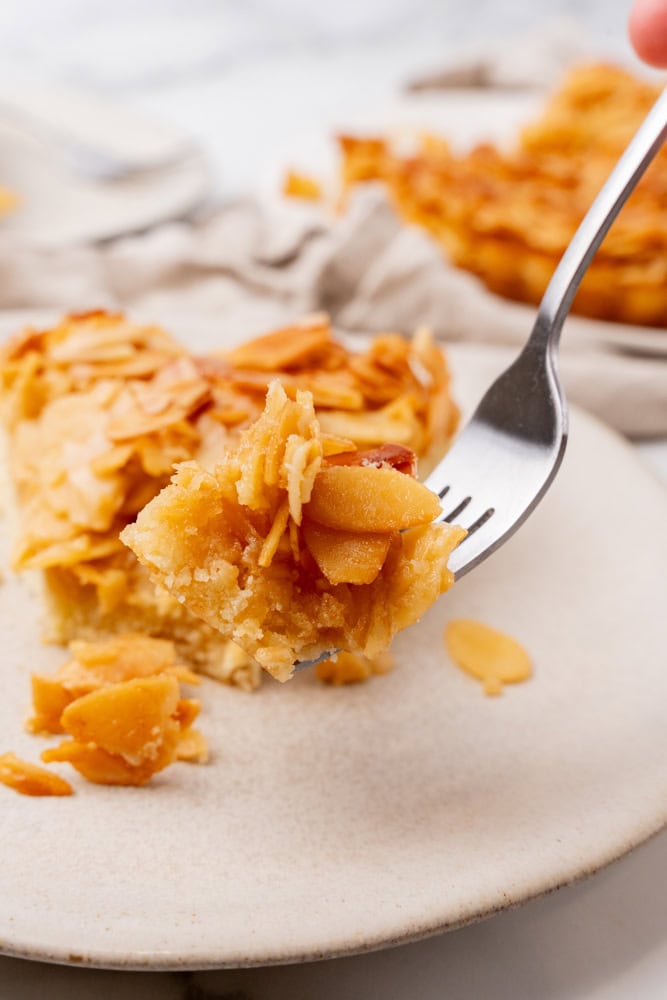 bite of almond tart on a fork