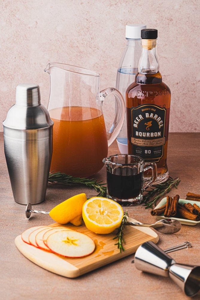 ingredients to make an apple cider bourbon cocktail