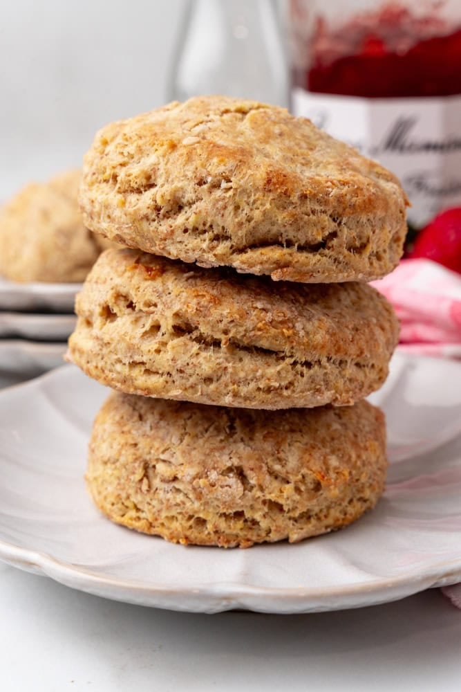 three whole wheat biscuits stacked up