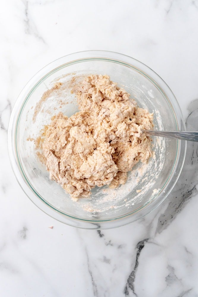 wet wheat biscuit flour mixture in glass bowl