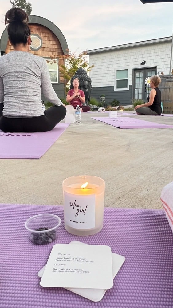 Candlelit gentle yoga and intention setting at sunset