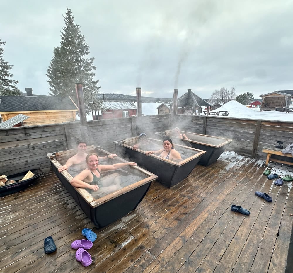 all of our group enjoying the hot tubs