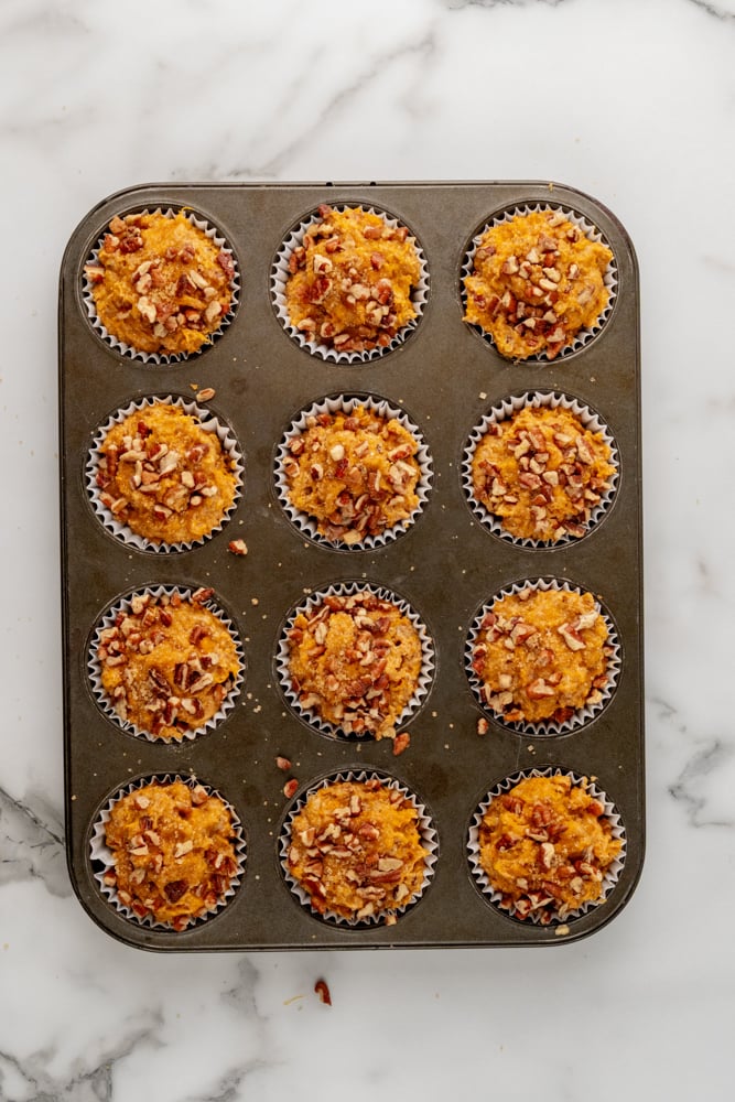 sweet potato muffins in a muffin tin after baking.