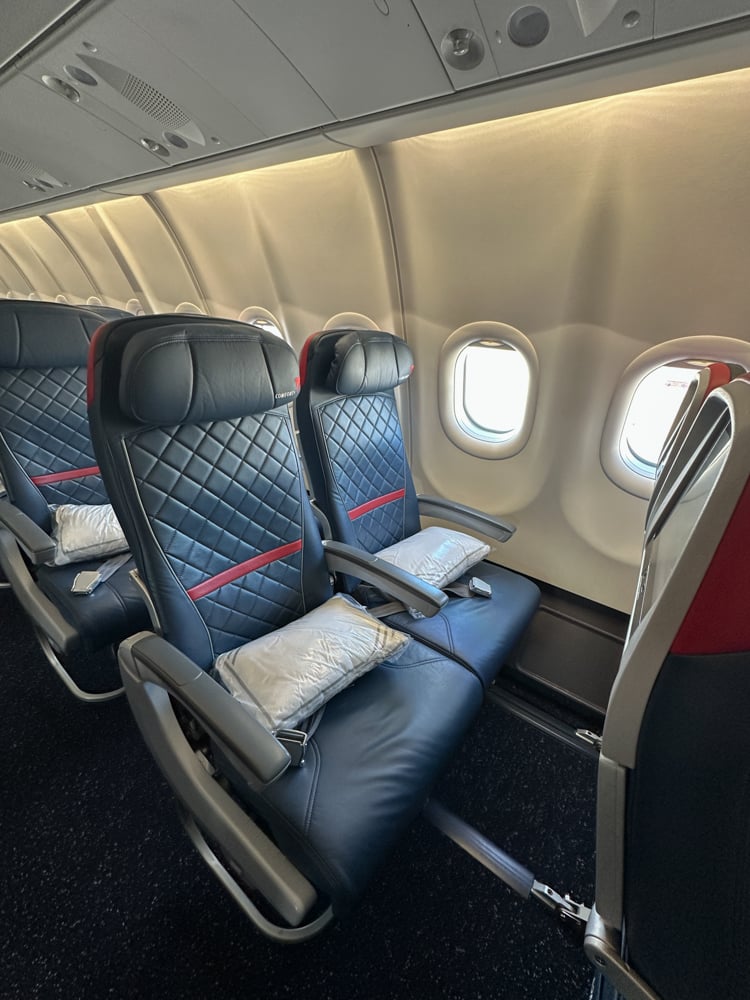 Wide angle view of two by two Delta Comfort + seats